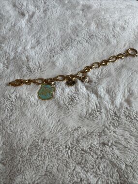 Juicy Couture Gold Link Charm Bracelet with Turquoise Enamel Shield